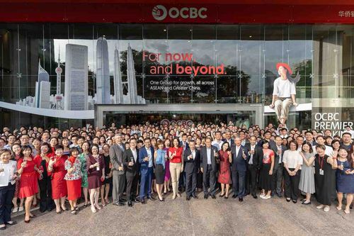 ocbc share price dividend may 2024